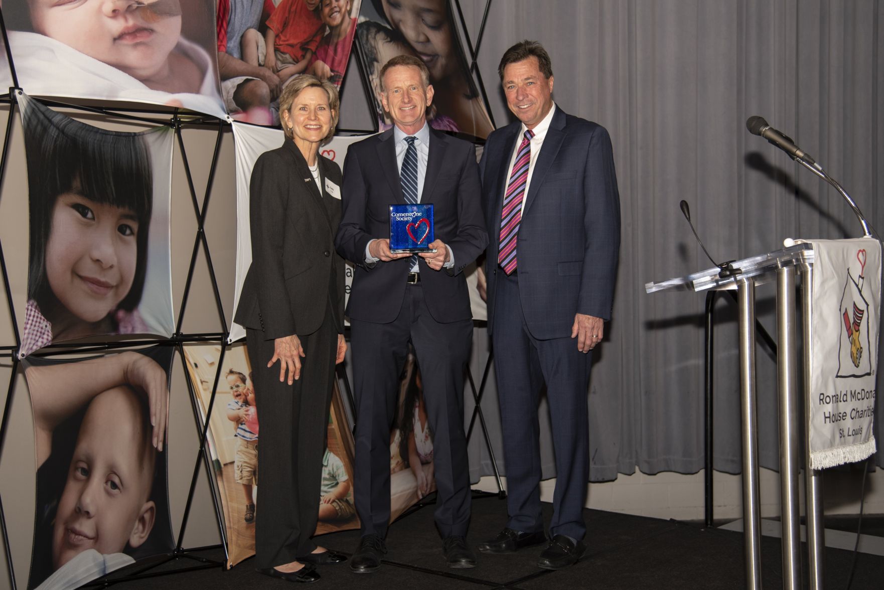Ronald McDonald House Charities of St. LouisÕ Cornerstone Society Corporation Award Ð Emerson.
Pictured are Deb Vogt, Dave Rabe, Dan Harbaugh.